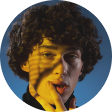 Portrait of Liam Thompson.